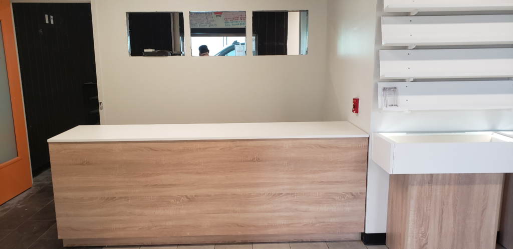 Mana Supply Edgewater - finished reception counter