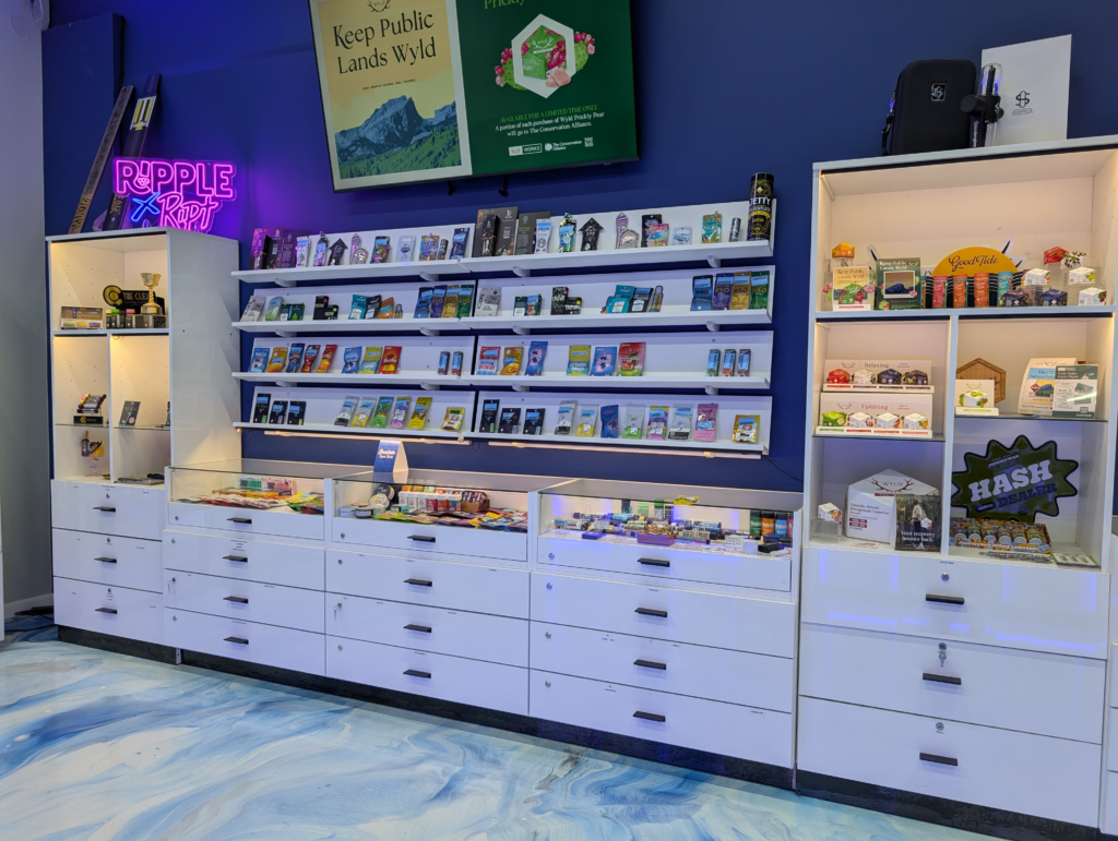 Elevations Dispensary - reception and merch wall