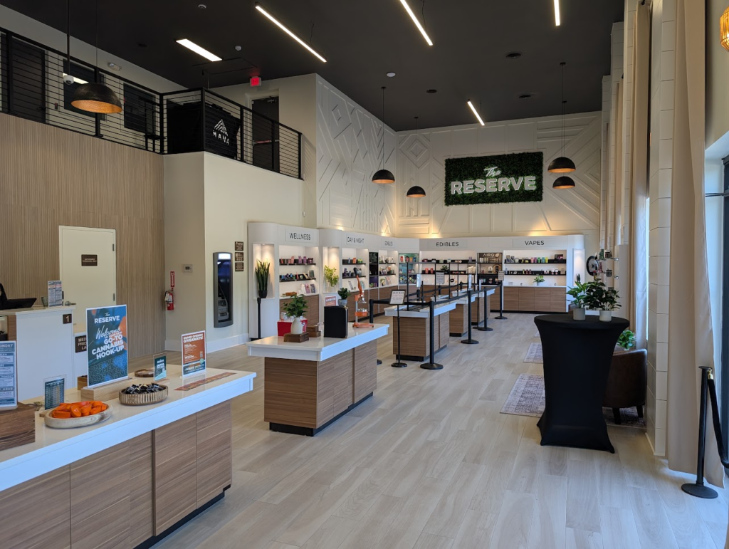 The Reserve Pasadena MD flagship sales floor with wellness, day & night, edibles and vapes merchandising wall